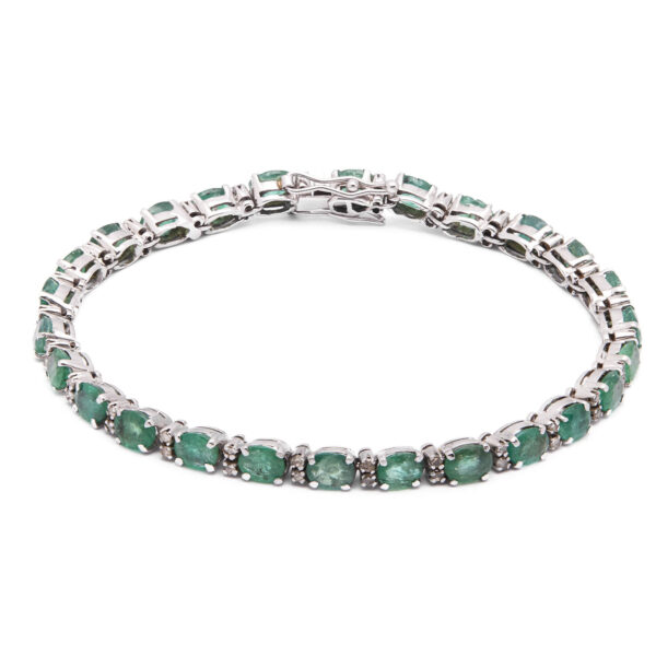 Bracciale tennis in oro bianco con smeraldi ovali e diamanti