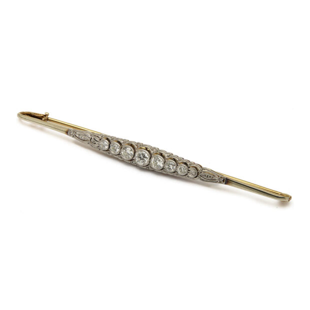 Spilla in oro giallo e bianco con diamanti