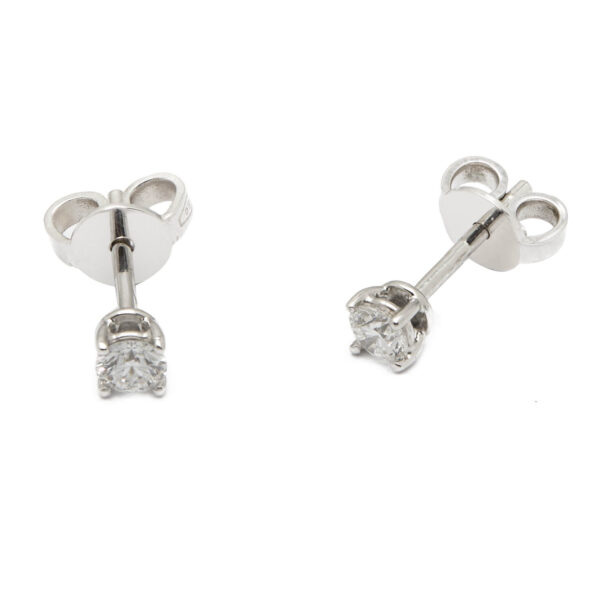 Orecchini punto luce in oro bianco  e diamanti 0,25ct
