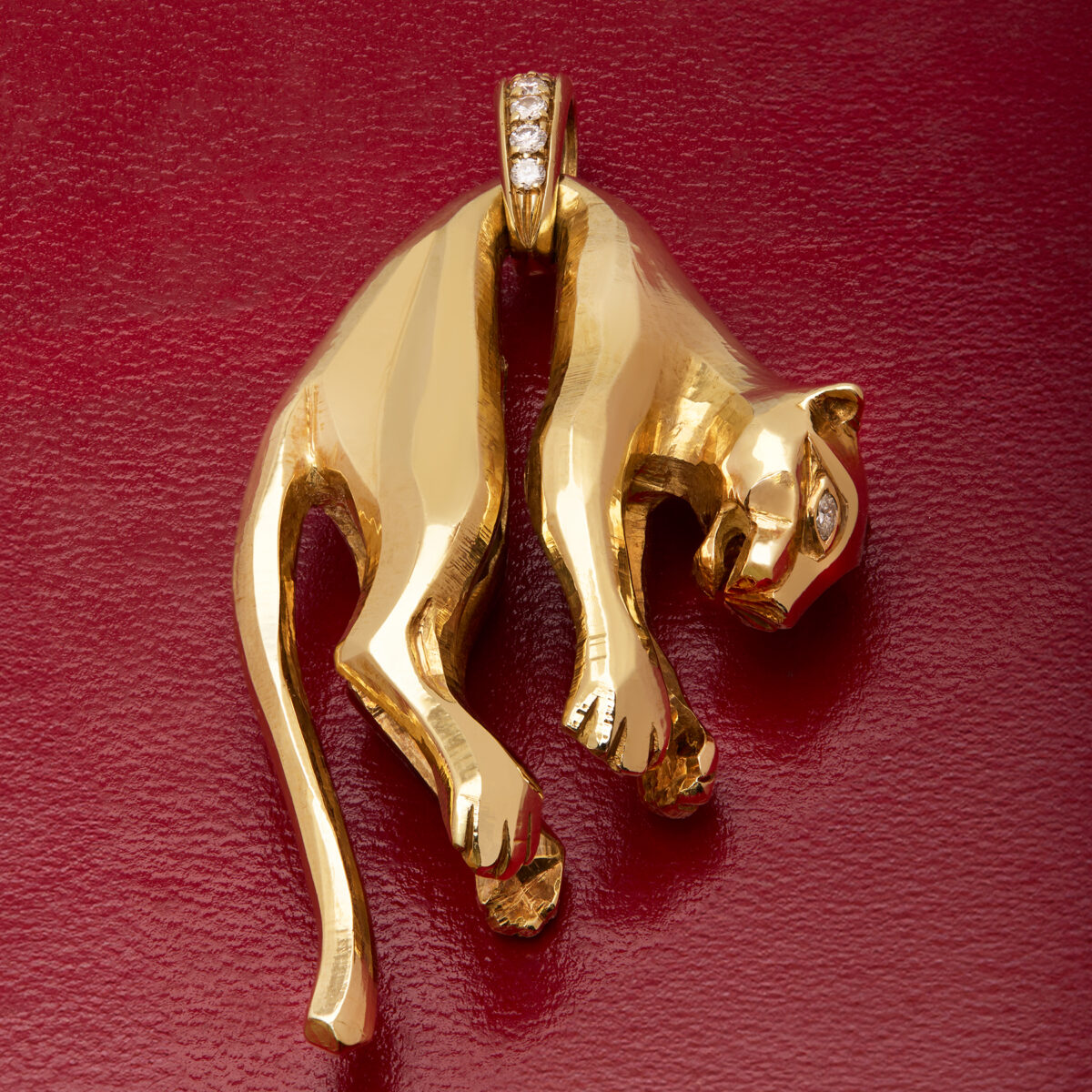 Ciondolo Cartier Panthere in oro giallo e diamanti 0,25ct