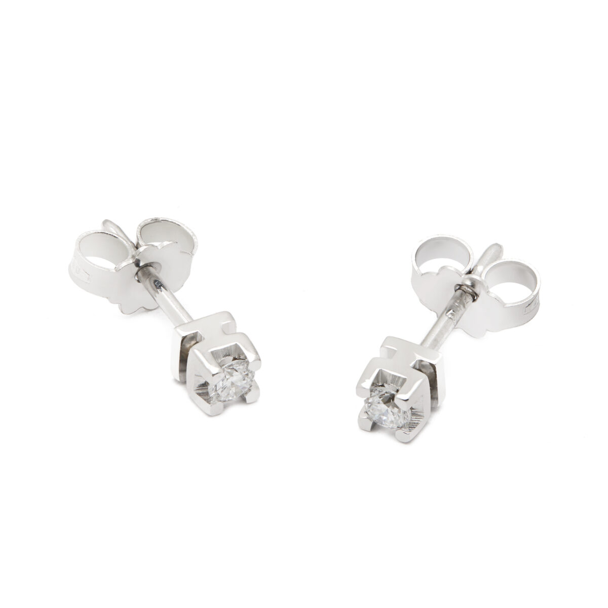 Orecchini punto luce in oro bianco e diamanti 0,10ct