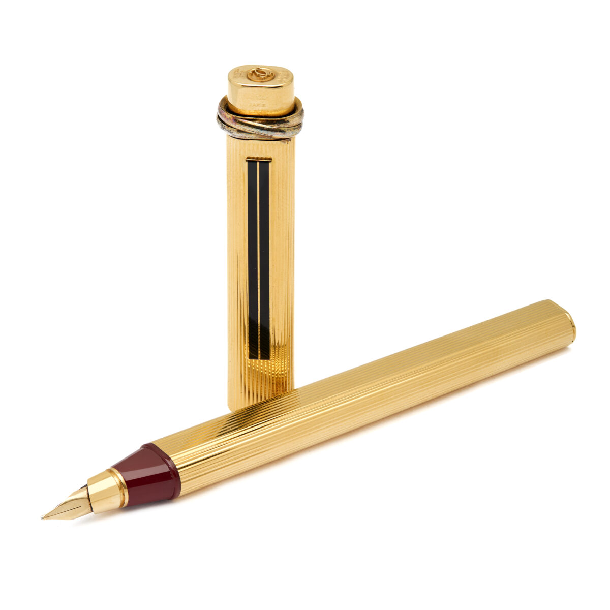 Penna stilografica Must trinity di Cartier placcata oro e smalto