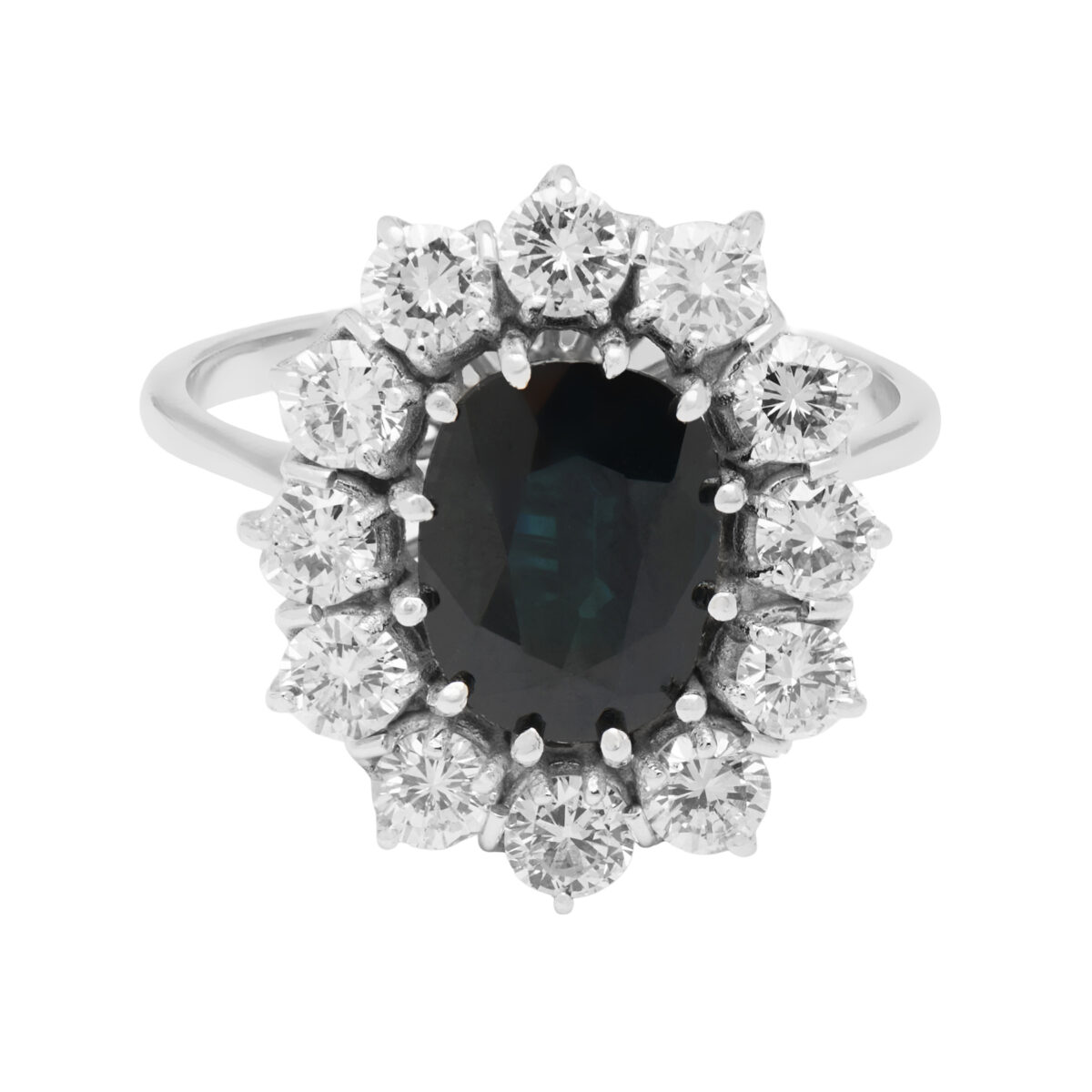 Anello fiore con zaffiro centrale e diamanti
